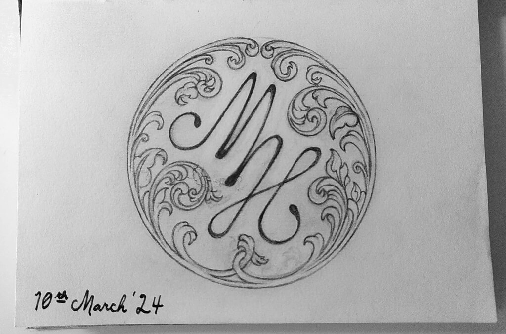 A calligraphic 'MH' emblem, surrounded by a circle of curling vines.