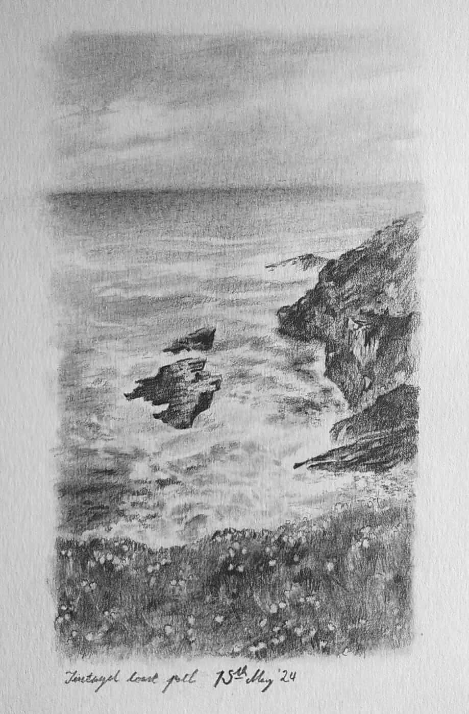 A graphite drawing of a jagged rocky shoreline sloping into a turbulent sea. Windswept grass and white flowers frame from below, a grey hazy sky from above.