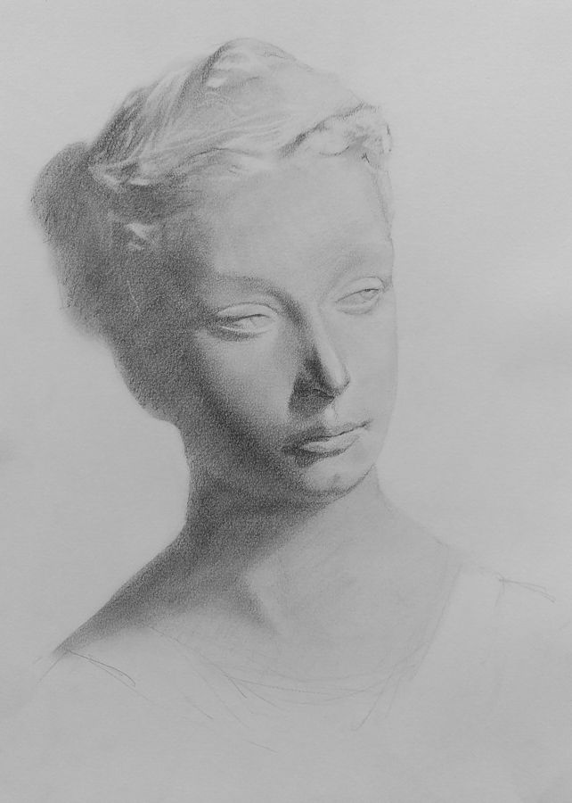Graphite drawing on coarse paper of a feminine head statue.